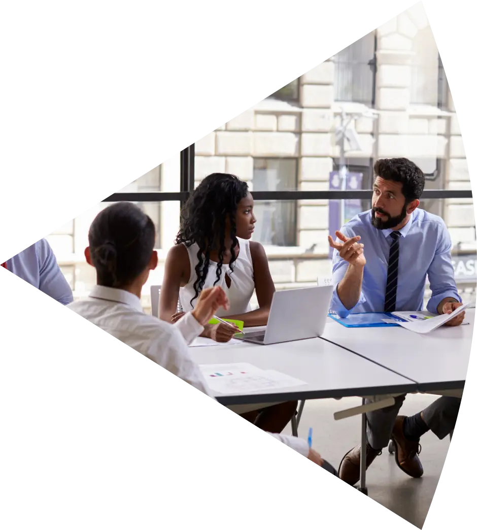 Business team meeting around table.